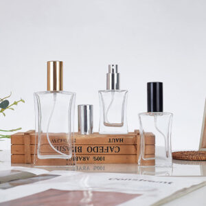 30ml 50ml 100ml Transparent Fragrance Empty Glass Perfume Bottle with Pump Aluminium Gold Cap and Cosmetic Press Spray Atomizer